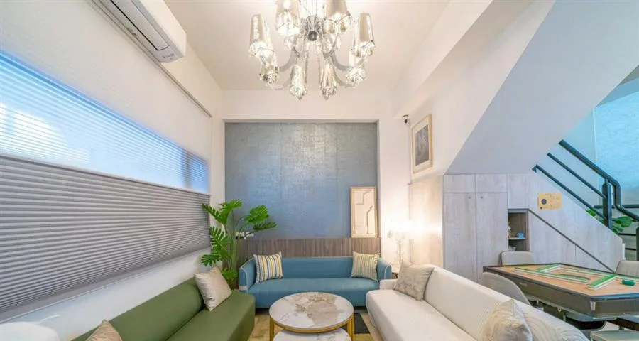 十月Mooon House｜挑高客廳與沙發